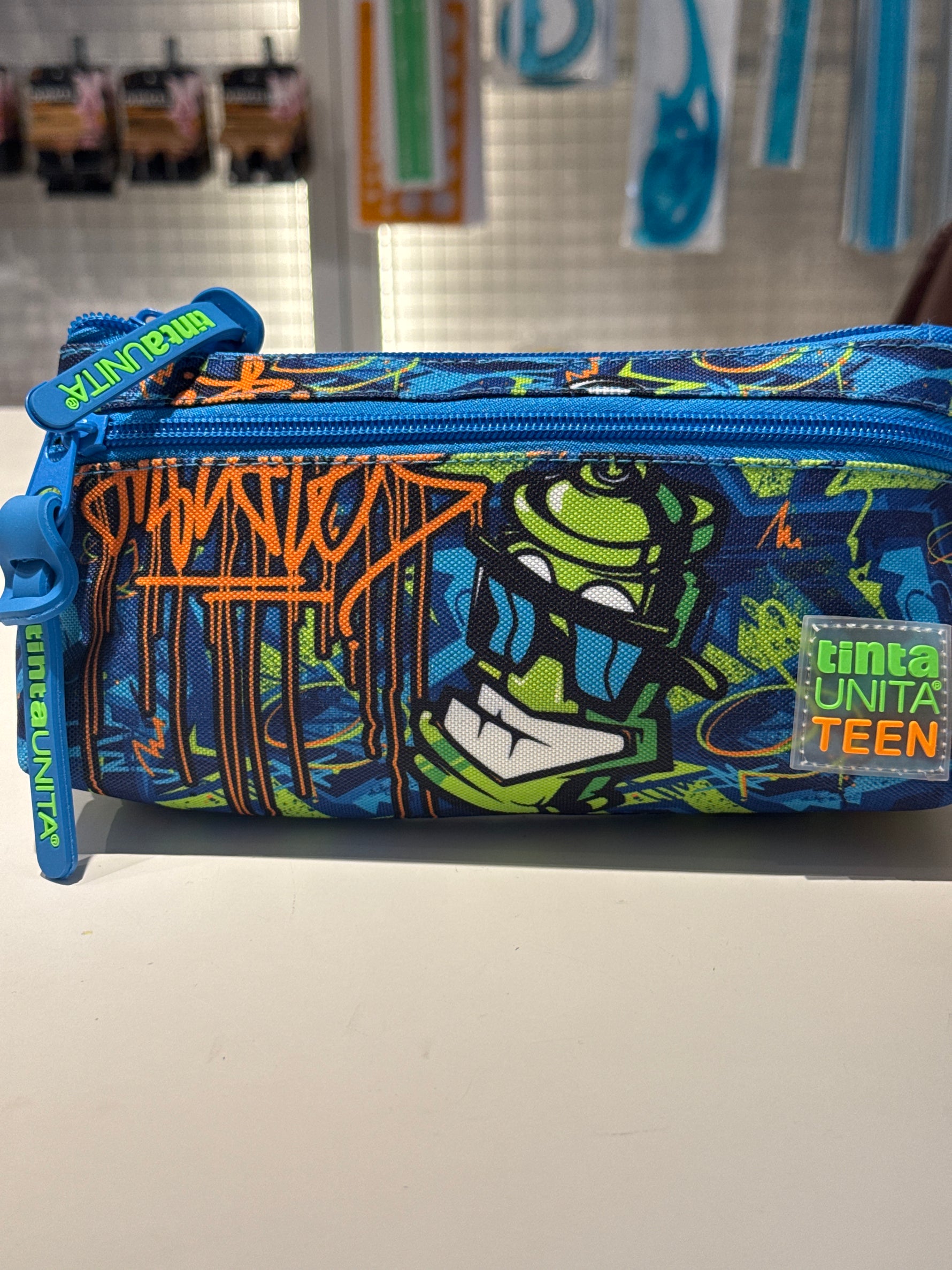 BUSTA 2ZIP TRIANGOLARE STREET