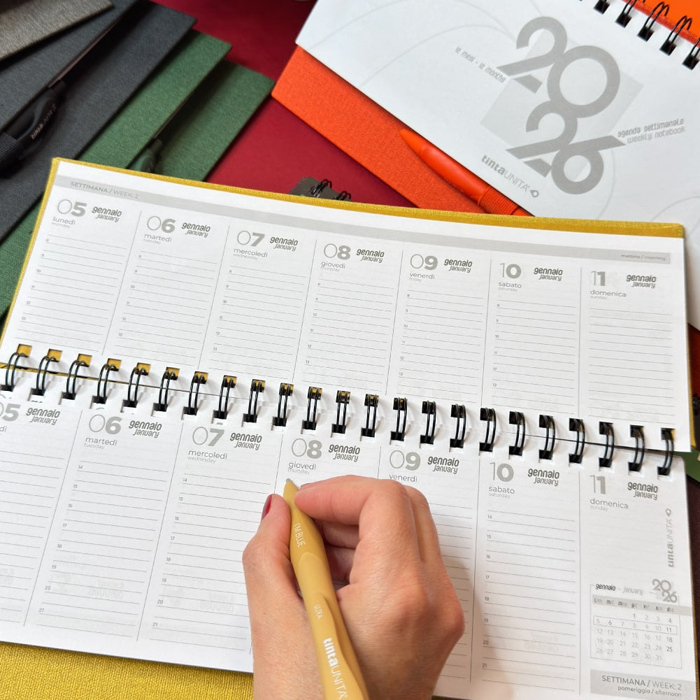 Planning da tavolo con penna